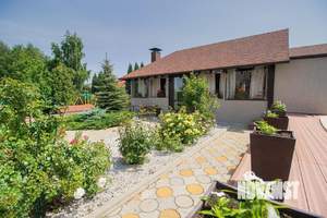 Коттедж 340м², 2-этажный, участок 24 сот.  
